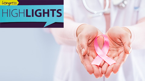 Brustkrebsschleife in den Hönden einer Ärztin