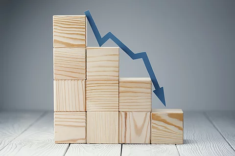 Falling graph on wooden cubes, on neutral background