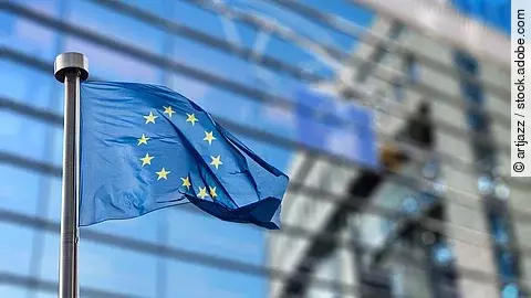 European Union flag against European Parliament