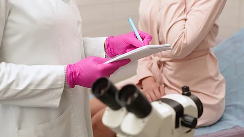 A female patient has a consultation with her gynecologist in a medical clinic. Women's health, colposcopy, examination of the uterus and ovaries.