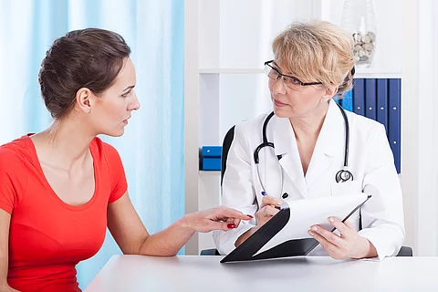 Doctor talking with patient about recommendations