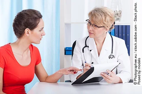 Doctor talking with patient about recommendations