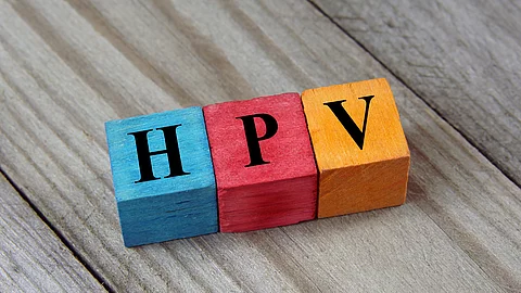HPV (Human Papillomavirus) acronym on colorful wooden cubes