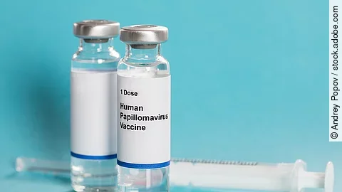 Human Papillomavirus Vaccine In Bottles With Syringe